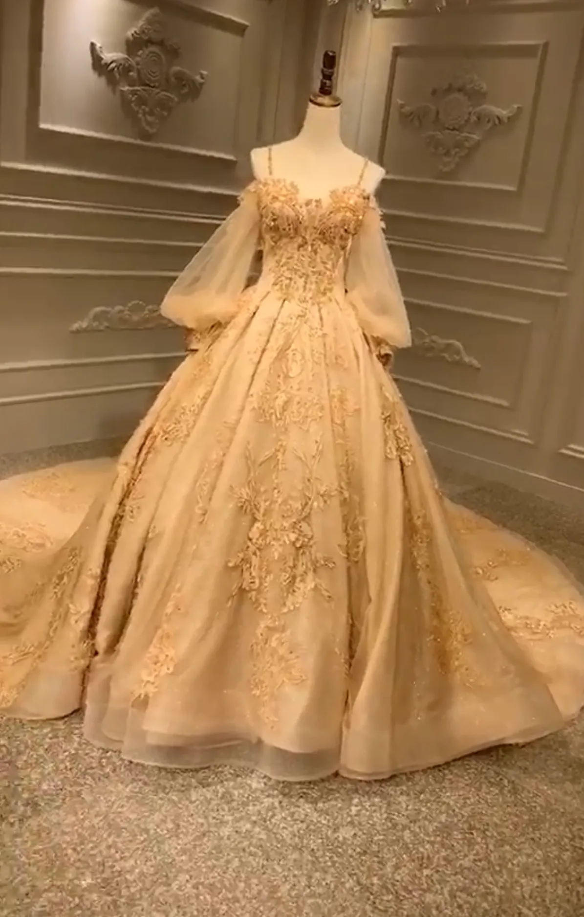 Unique off shoulder with puffy sleeves lace appliqués heavy beaded gold luxurious Long wedding gown