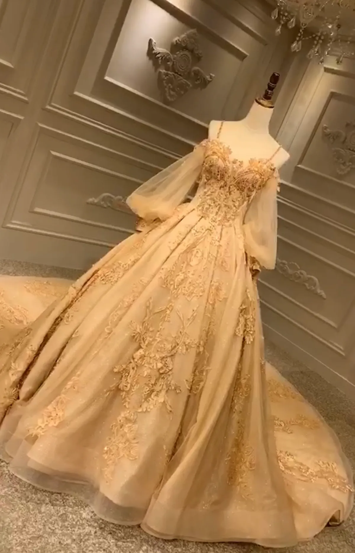 Unique off shoulder with puffy sleeves lace appliqués heavy beaded gold luxurious Long wedding gown