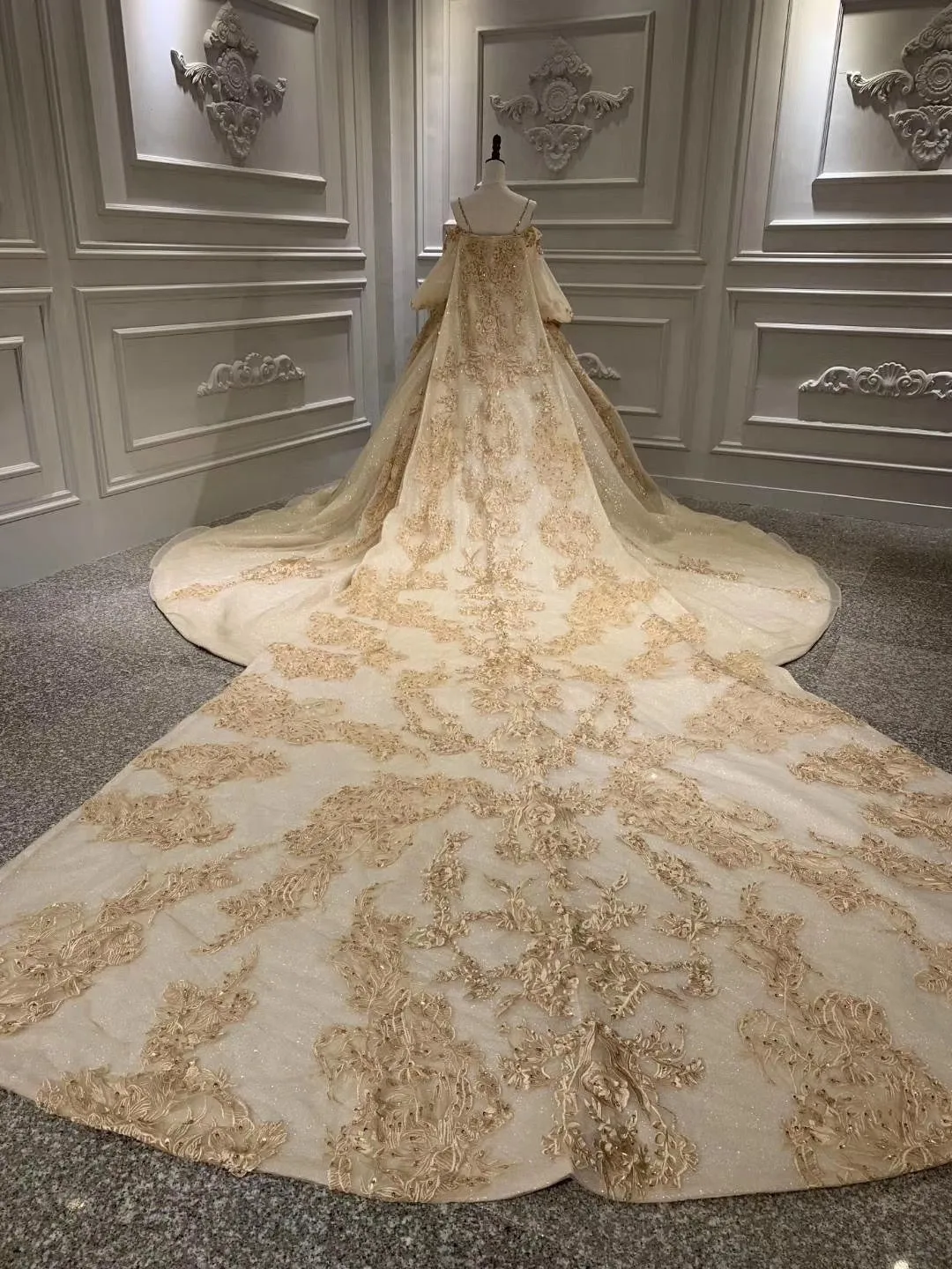 Unique off shoulder with puffy sleeves lace appliqués heavy beaded gold luxurious Long wedding gown