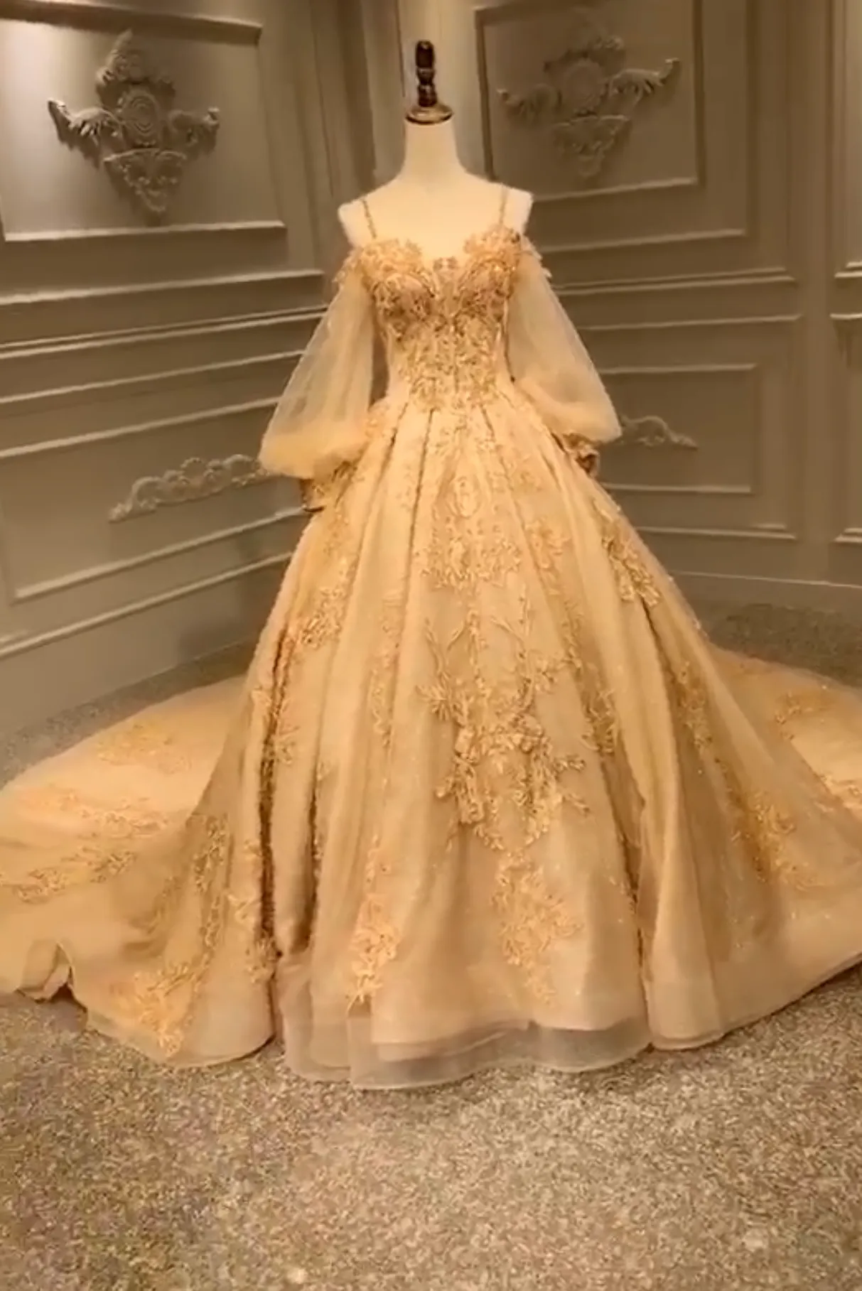 Unique off shoulder with puffy sleeves lace appliqués heavy beaded gold luxurious Long wedding gown