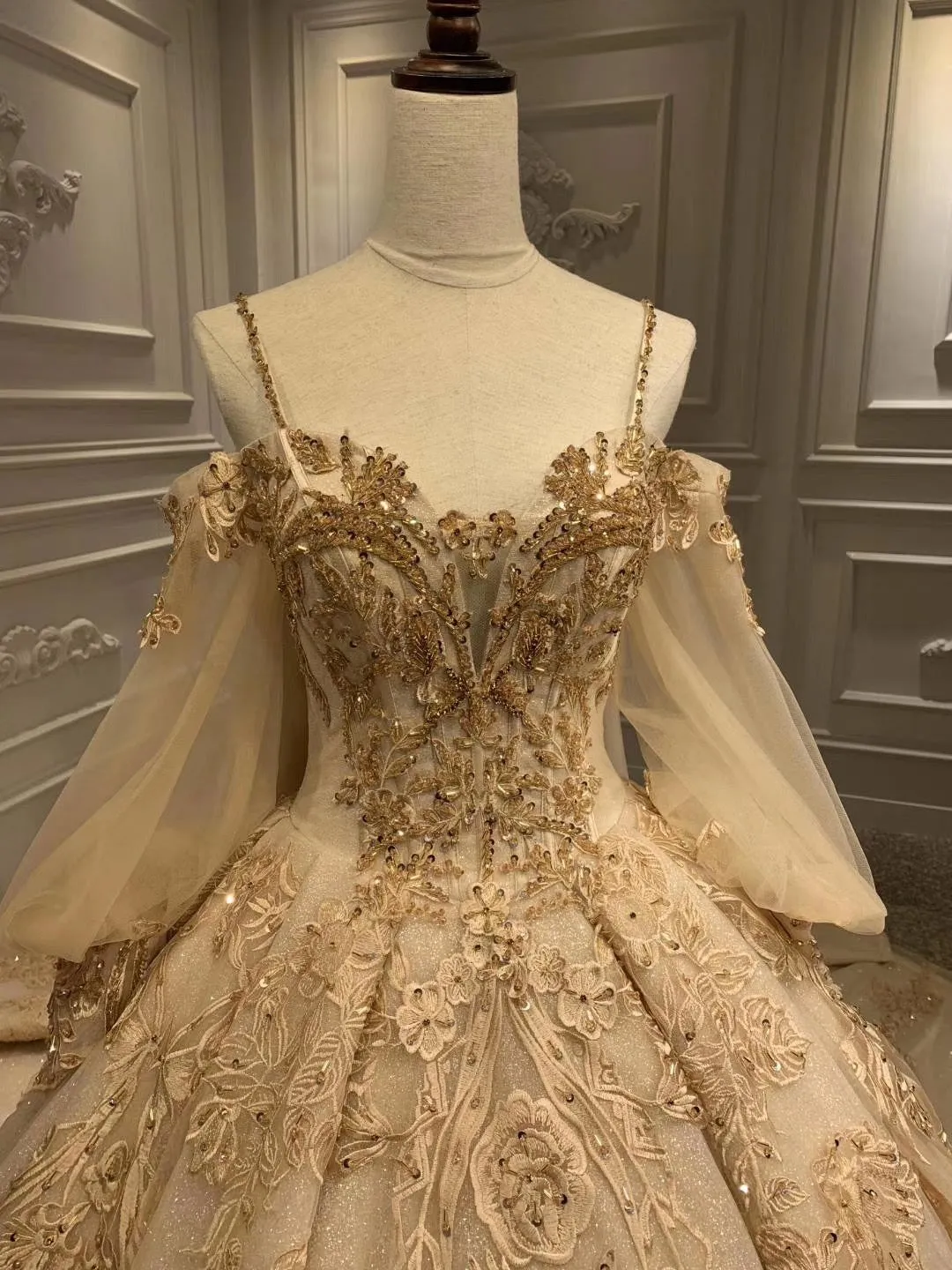 Unique off shoulder with puffy sleeves lace appliqués heavy beaded gold luxurious Long wedding gown